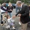 Cliff shakes hands at the Four-Town Fair Parade on Sept. 16.